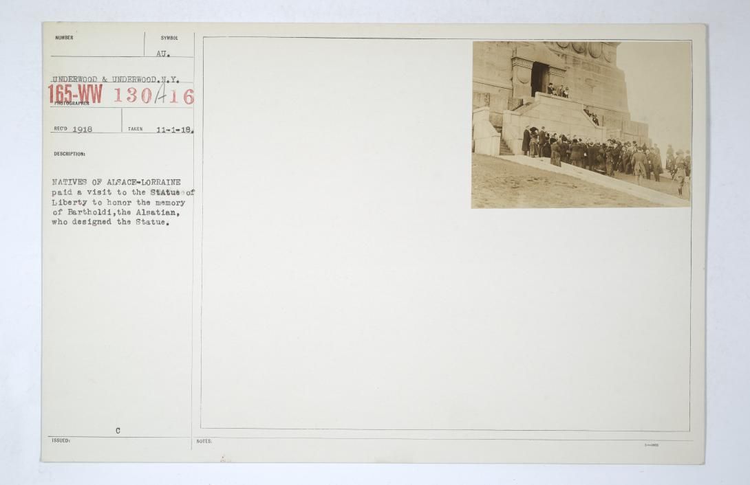 Commissions - France - Foreign Legions and Miscellaneous - Natives of Alsace-Lorraine paid a visit to the Statue of Liberty to honor the memory of Bartholdi, the Alsatian, who designed the statue Taken: November 1, 1918 Commissions – France – Foreign Legions and Miscellaneous American Unofficial Collection of World War I Photographs 1917-1918 Record Group 165 Records of the War Department General and Special Staffs 1860-1952 Local ID: 165-WW-130A-16 NAID: 26432096