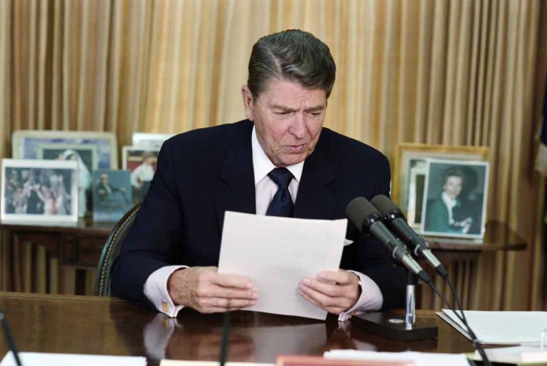 President Ronald Reagan participating in a taping session of his Radio Address to the Nation on Independence Day and the Centennial of the Statue of Liberty in the Oval Office 07/03/1986