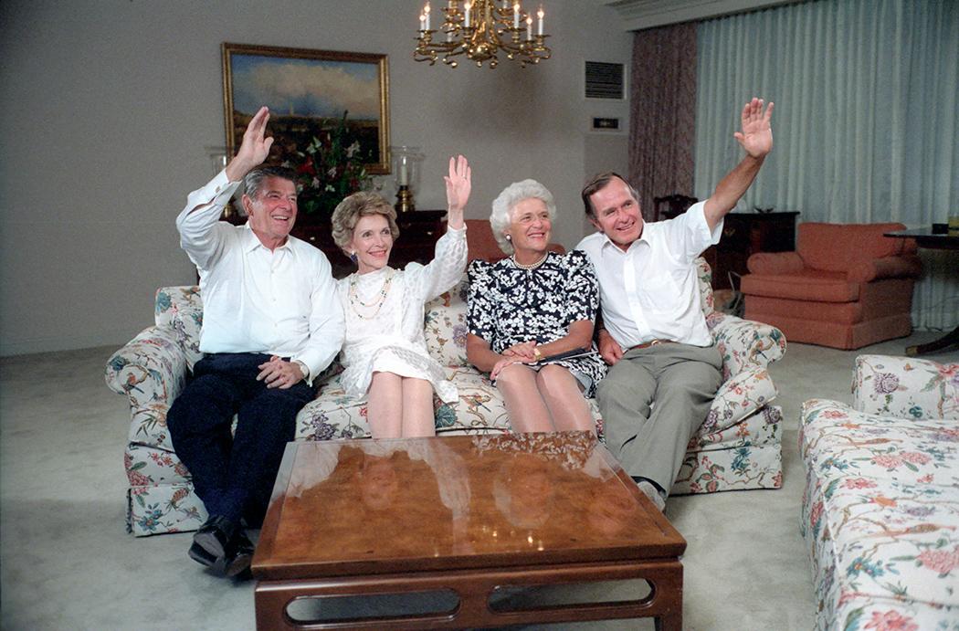 President Ronald Reagan, Nancy Reagan, Barbara Bush, and Vice President George Bush waving to the crowd at the Republican National Convention via satellite in Dallas, Texas 08/22/1984 