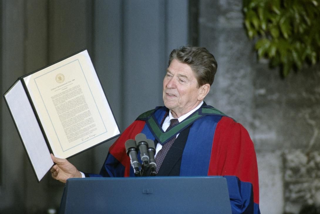 President Ronald Reagan presenting a proclamation recognizing Galway’s 500th anniversary during his Remarks at University College, Galway, Ireland, 06/02/1984