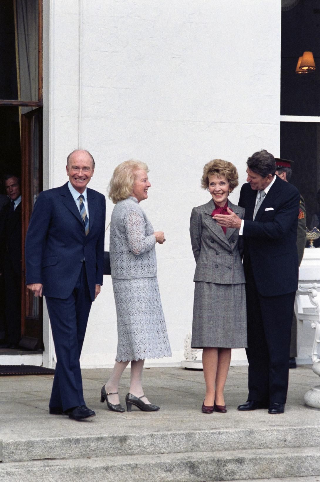 President Ronald Reagan, Nancy Reagan, U.S. Ambassador to Ireland Robert Kane, and Mary Catherine (Keke) Galligan Kane outside Deerfield Residence, the United States Ambassador’s Residence in Dublin, Ireland, 06/03/1984