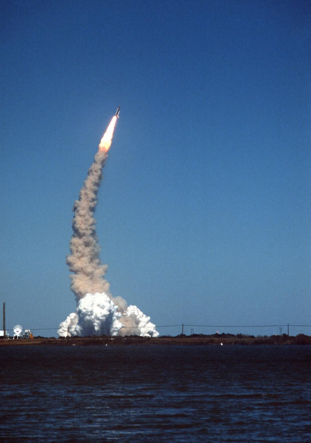 The Space Shuttle Challenger lifts off from its launch pad at the Kennedy Space Center. Note: Second view in a series of eight Record Group 330: Records of the Office of the Secretary of Defense 1921-2008 Series: Combined Military Service Digital Photographic Files 1982-2007 Produced: January 28, 1986. NAID: 6413309.