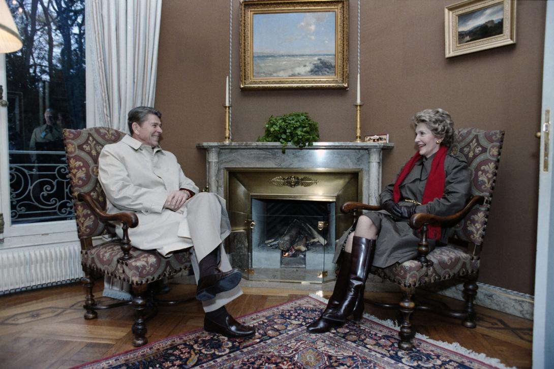 President Ronald Reagan and Nancy Reagan sitting and talking while on a tour of Villa Fleur d’Eau in Geneva, Switzerland, 11/17/1985