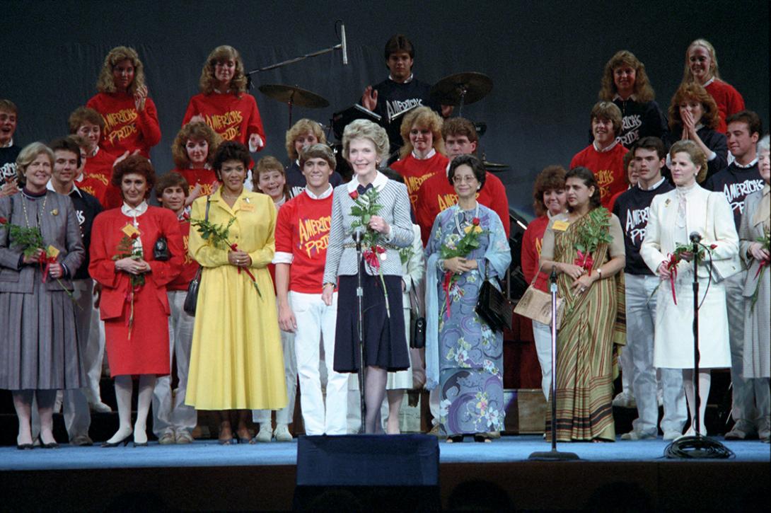 Nancy Reagan holding flowers during the second day of the First Ladies Conference on Drug Abuse at The Georgia World Congress Center in Atlanta, Georgia dated 04/25/1985 NAID: 404525231
