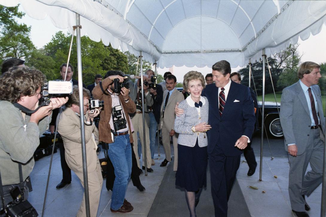 Nancy Reagan and President Ronald Reagan hugging after her arrival back to the White House from Atlanta, Georgia dated 04/25/1985
