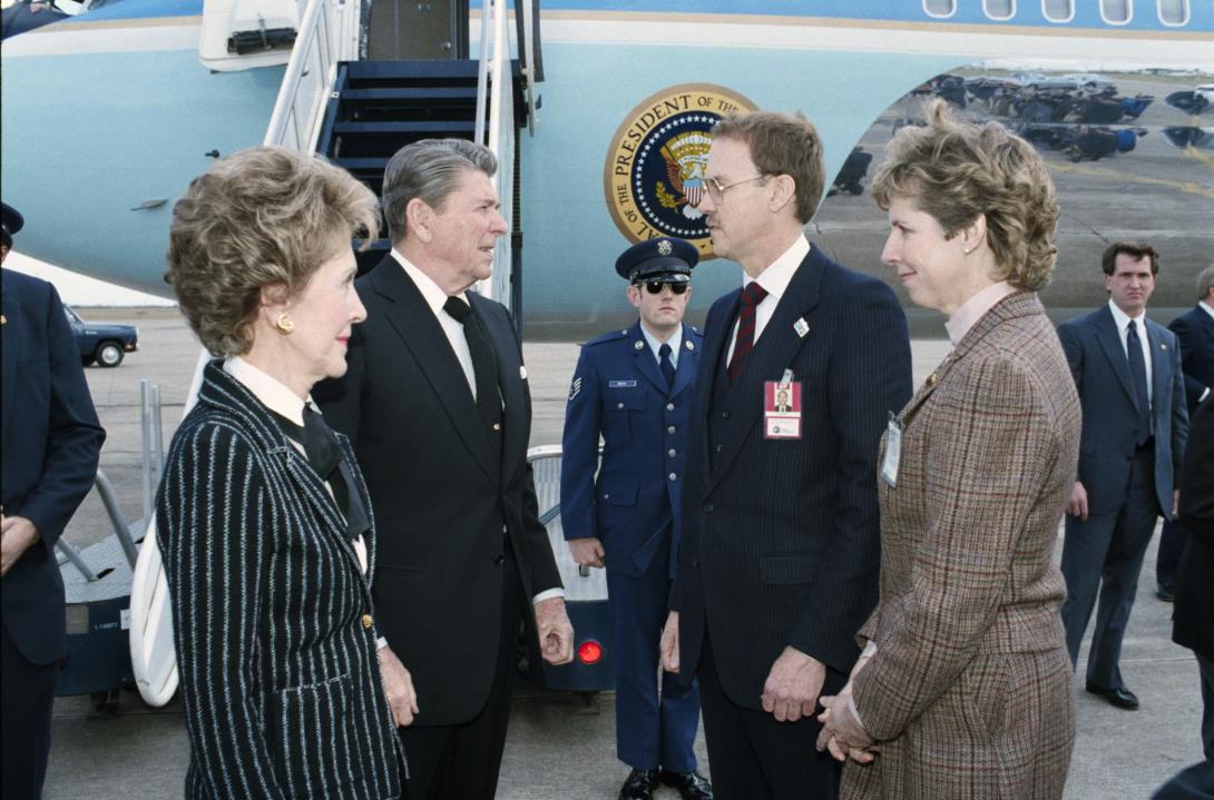 President Ronald Reagan and Nancy Reagan arriving via Air Force 1 in Houston, Texas for the memorial service for the crew of the Space Shuttle Challenger with acting administrator of the National Aeronautics and Space Administration (NASA)William Graham. 01/31/1986. C33145-12.