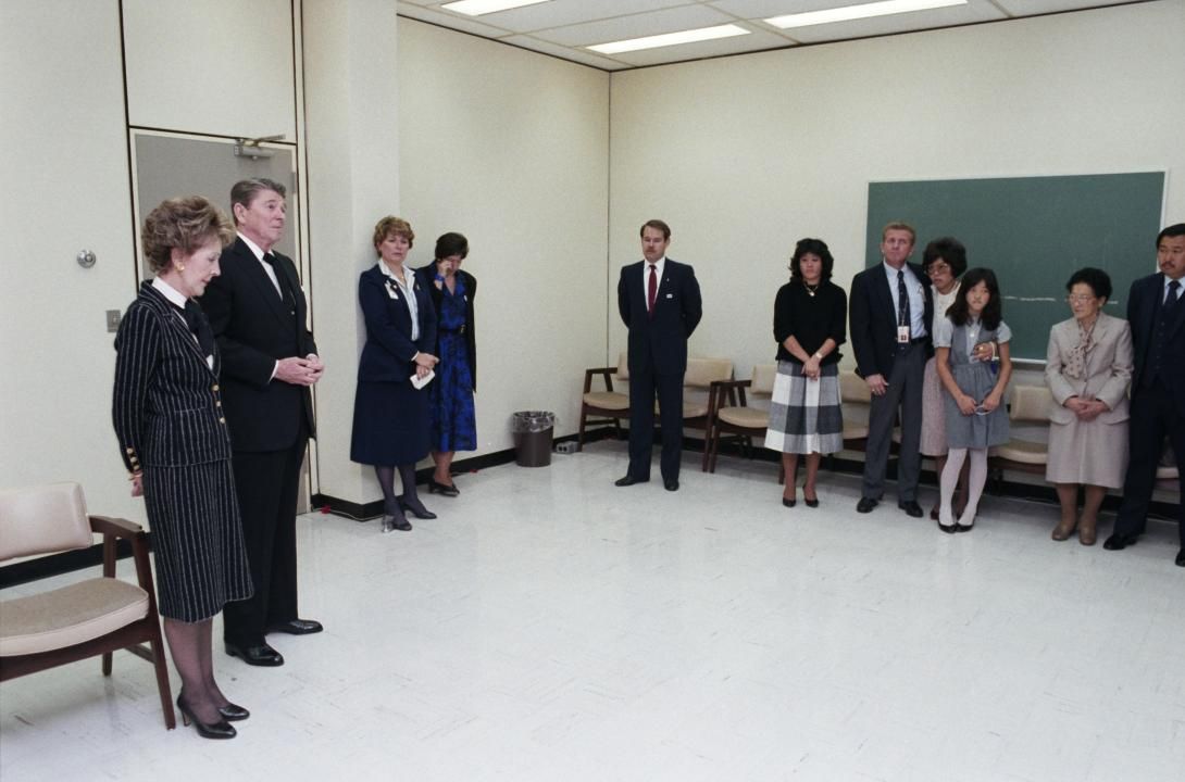 President Ronald Reagan and Nancy Reagan with the families of the crew of the Space Shuttle Challenger. 01/31/1986. C33142-04.