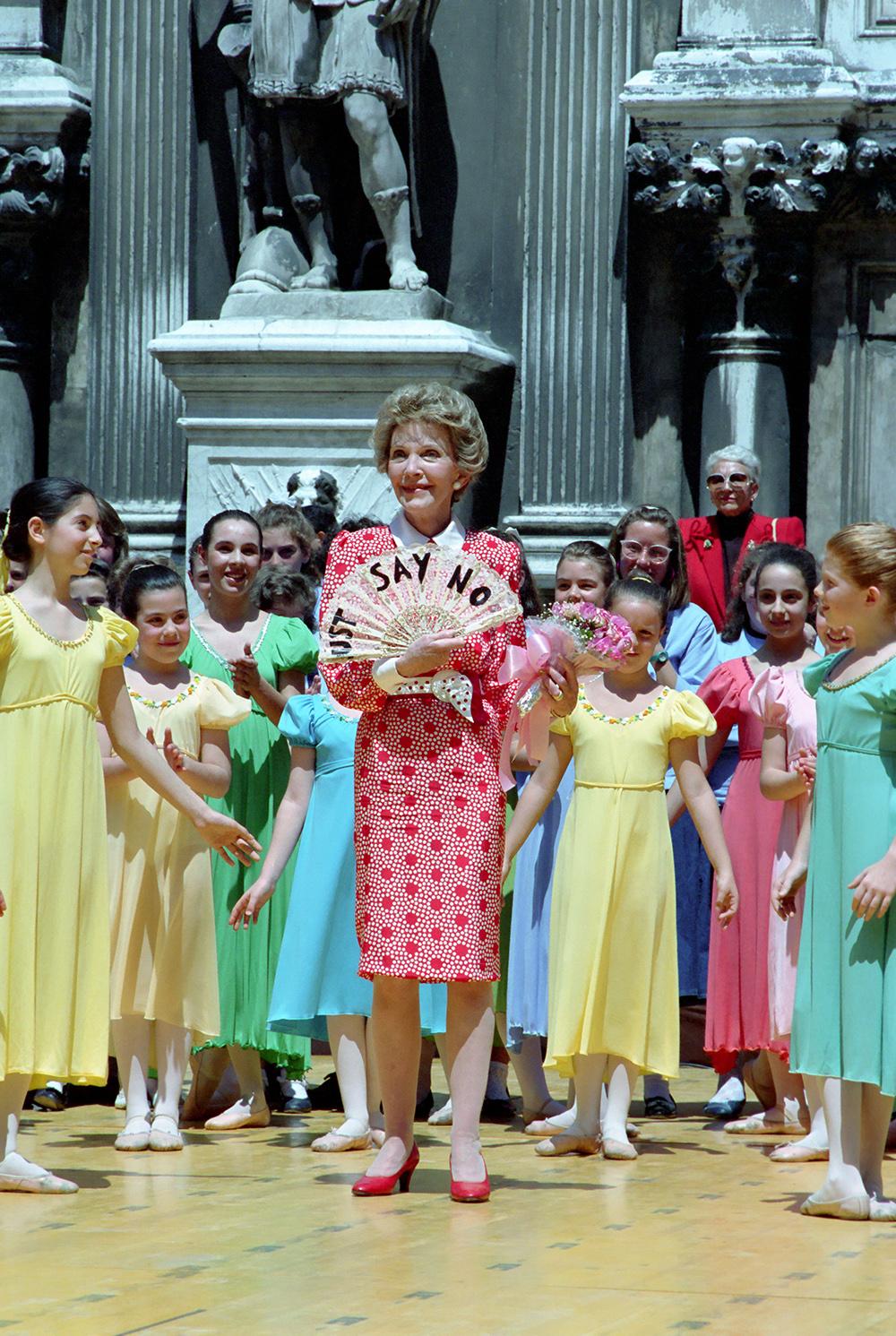 Nancy Reagan holding a “Just Say No” fan at an arts and crafts exhibit at Palazzo Ducale in Venice, Italy  dated 06/11/1987 NAID: 404525391