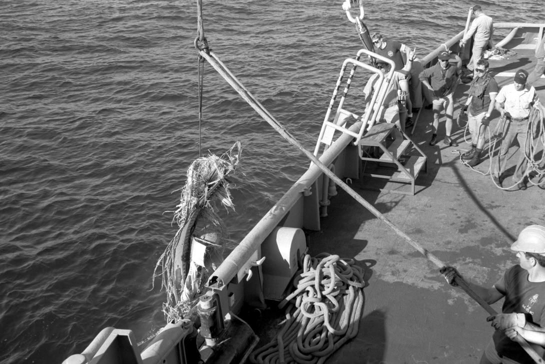 A piece of debris is hoisted aboard the salvage ship USS PRESERVER (ARS 8) during recovery operations for the Space Shuttle Challenger Record Group 330: Records of the Office of the Secretary of Defense 1921-2008 Series: Combined Military Service Digital Photographic Files 1982-2007 Produced: February 1, 1986. Local ID: 330-CFD-DB-SN-86-06854. NAID: 6407036.