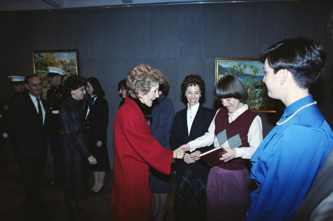 Nancy Reagan greeting personnel at the U.S. Mission in Geneva, Switzerland, 11/20/1985