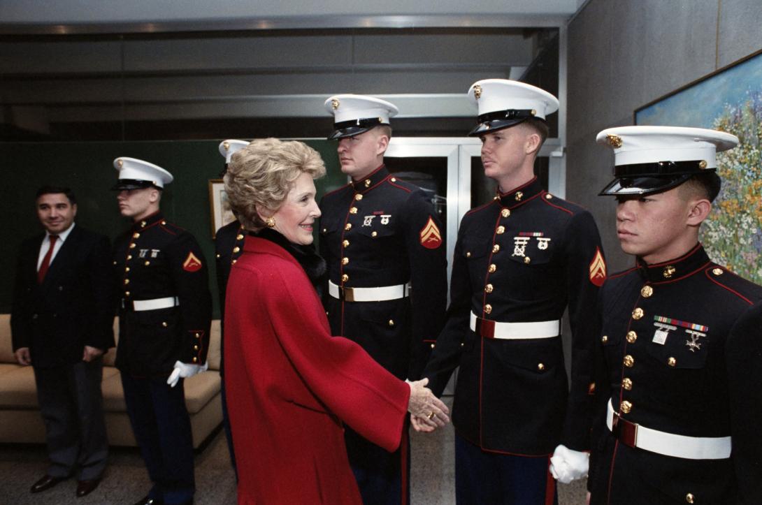 Nancy Reagan greeting members of the United States Marine Corps at the U.S. Mission in Geneva, Switzerland, 11/20/1985