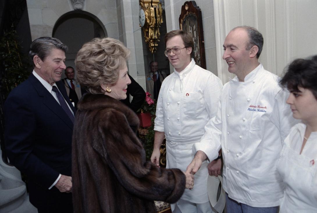 President Ronald Reagan and Nancy Reagan shaking hands during their departure from Maison de Saussure in Geneva, Switzerland, 11/21/1985