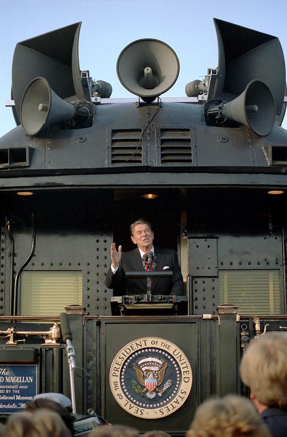 President Ronald Reagan delivering remarks aboard the <em> Ferdinand Magellan</em> railcar in Ottawa, Ohio during the whistle-stop tour through Ohio 10/12/1984 