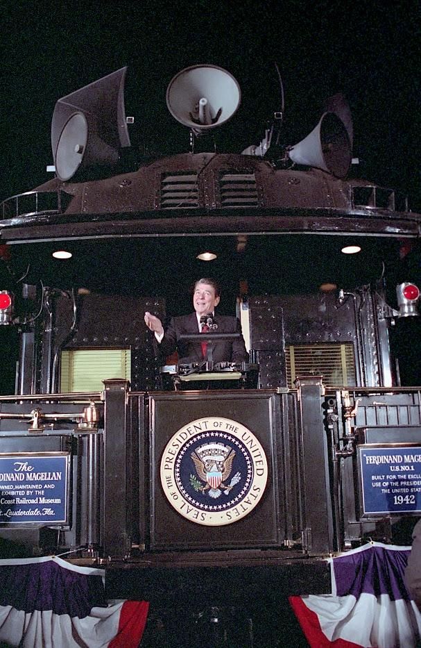 President Ronald Reagan delivering remarks in Perrysburg, Ohio aboard the <em>Ferdinand Magellan</em> railcar during the whistle-stop tour through Ohio 10/12/1984