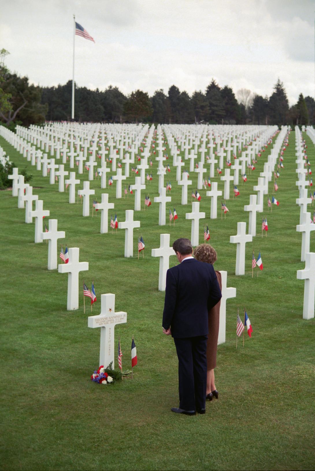 President Reagan and Nancy Reagan at the Normandy American Cemetery and Memorial visiting the gravesite of Brigadier General Theodore Roosevelt, Jr., U.S. Army